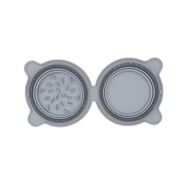 Top view of a gray 2-in-1 Collapsible Travel Slow Feeder - Portable Hydration & Feeding Station with one side featuring slow feeder ridges and the other side a smooth water bowl surface.