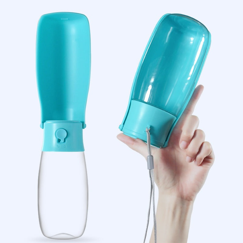 Large Capacity Folding Travel Cup - 550ml Portable Hydration Station shown in a compact, foldable design with turquoise and transparent sections, held in hand for travel convenience.