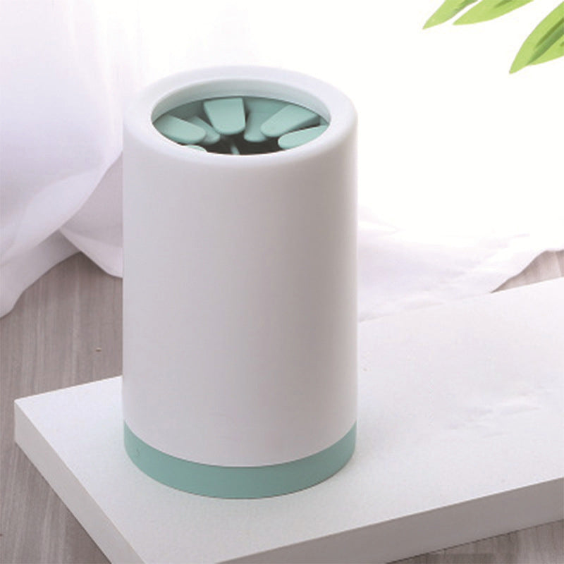 Portable Dog Foot Washer - Professional Muddy Paw Cleaning Cup with soft silicone bristles inside a sleek white and mint green cylindrical design for easy pet paw cleaning.