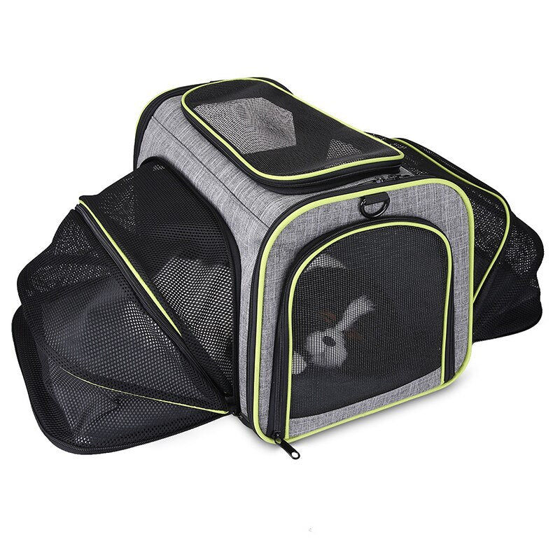 Professional Mesh Adventure Backpack - Expandable High-Ventilation Travel Carrier in gray with black and neon green trim, featuring multiple mesh panels and expandable sides.