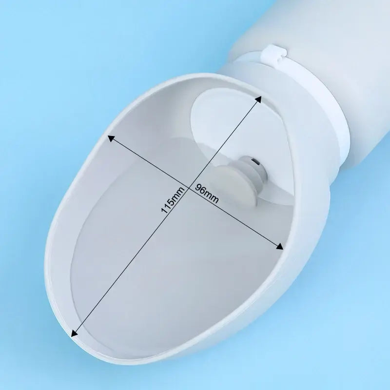 Close-up view of the Soft Silicone Ultra-Compact Dispenser – 550ml Lightweight Minimalist Travel Bottle showing the dispenser’s wide, rounded silicone opening with measurement indicators inside against a light blue background.