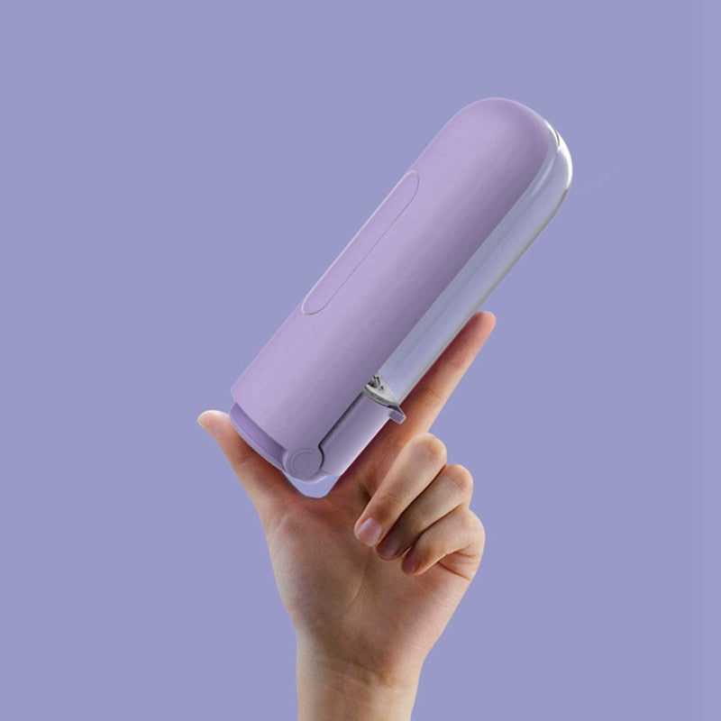 Hand holding a sleek lavender Professional Slim Leakproof Travel Flask - 420ml High-Capacity Water Feeder against a matching purple background, showcasing its compact and modern design.
