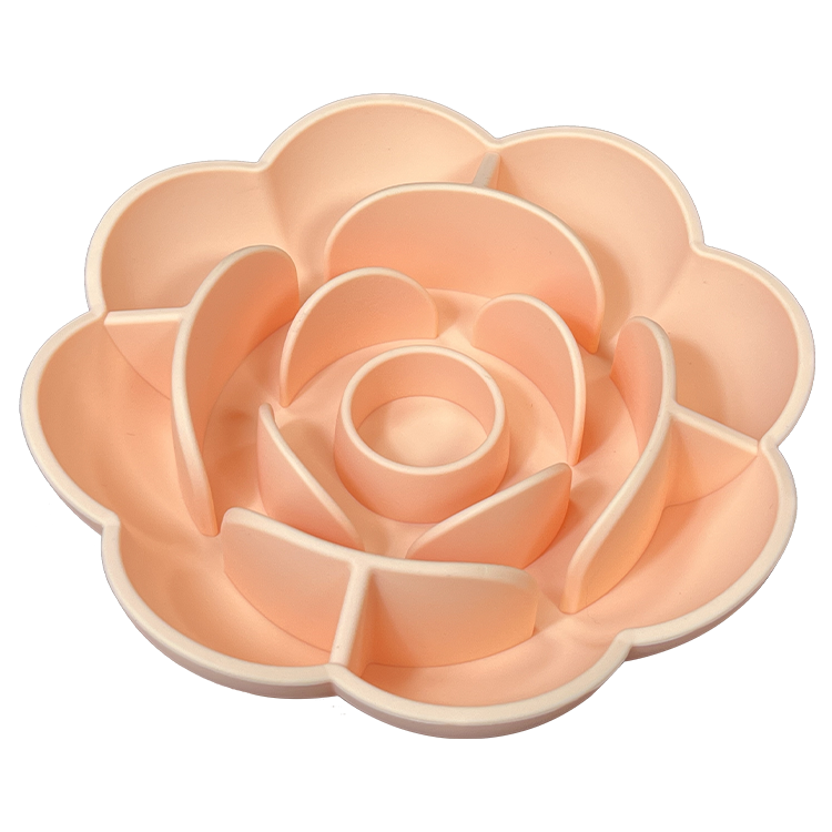 Silicone Flower Lick Bowl - Soothing Slow Feeder & Anxiety Relief Mat in soft peach color designed to slow pet feeding and reduce anxiety with an ergonomic flower-shaped layout.
