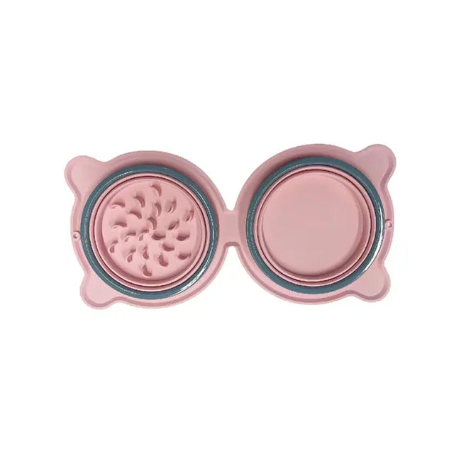 Top view of a pink 2-in-1 Collapsible Travel Slow Feeder - Portable Hydration & Feeding Station with an ergonomic slow feeder bowl on the left and a collapsible water bowl on the right.
