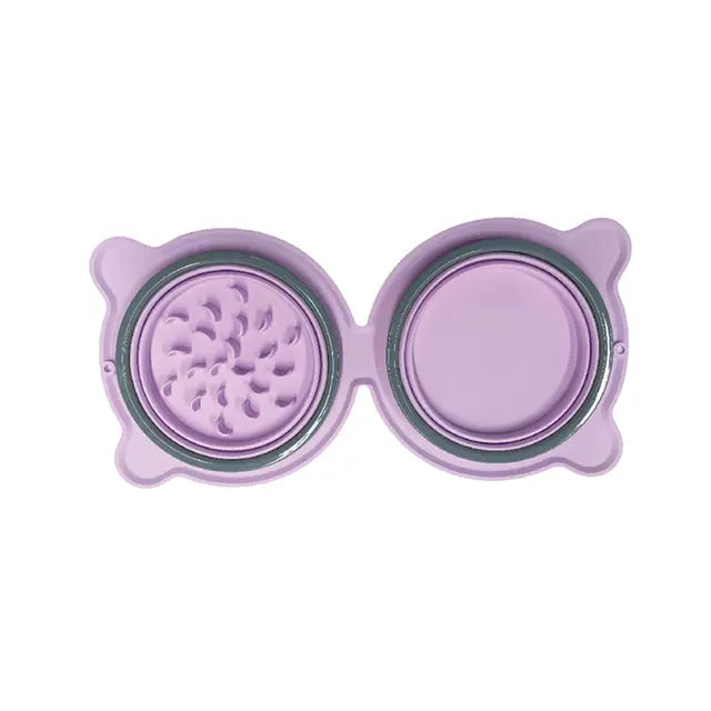 Top-down view of a lavender 2-in-1 Collapsible Travel Slow Feeder - Portable Hydration & Feeding Station with one side featuring a slow feeder design and the other a smooth water bowl.