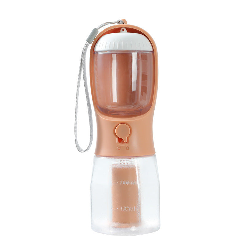 Compact portable pet water dispenser with integrated button release and wrist strap, designed for travel convenience in the 3-in-1 Pet Travel Station – Integrated Water, Food & Waste Management.