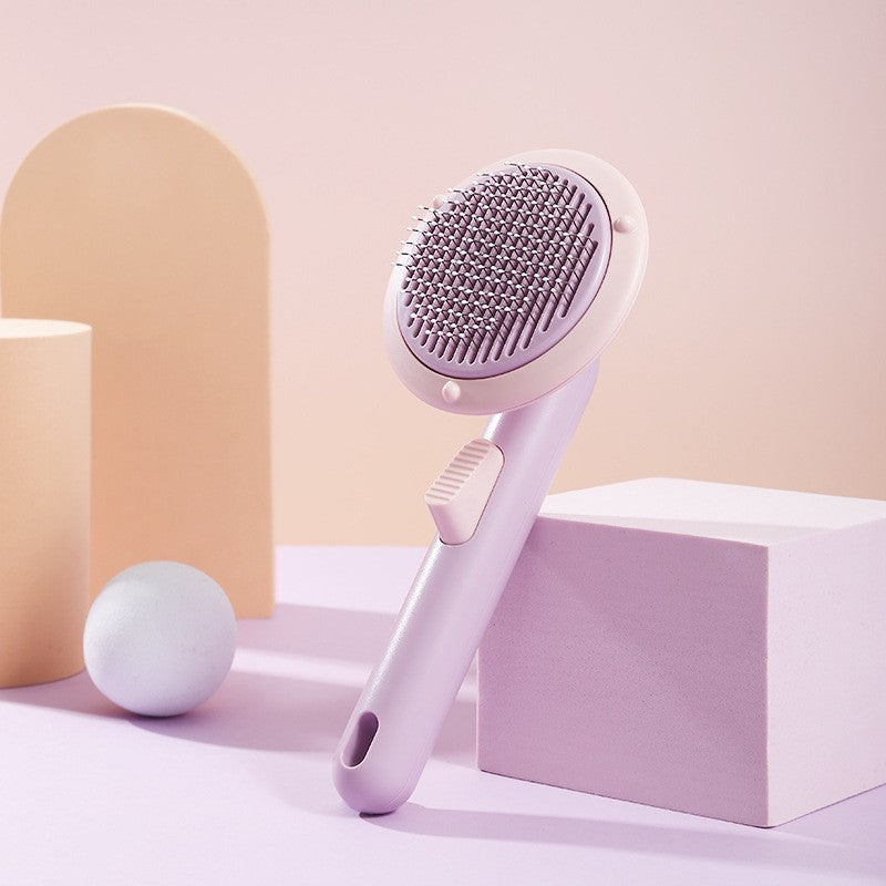 Boutique Pumpkin Self-Cleaning Brush - Aesthetic Grooming & Deshedding Comb in soft pastel lavender, featuring ergonomic handle and self-cleaning button, styled with modern decor background.