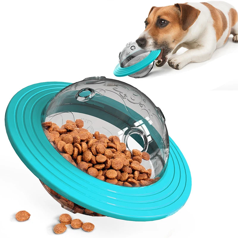 Dog engaging with a turquoise and transparent Interactive Flying Saucer Puzzle Feeder - IQ Training & Slow Feed Toy filled with kibble for mental stimulation and slower eating.