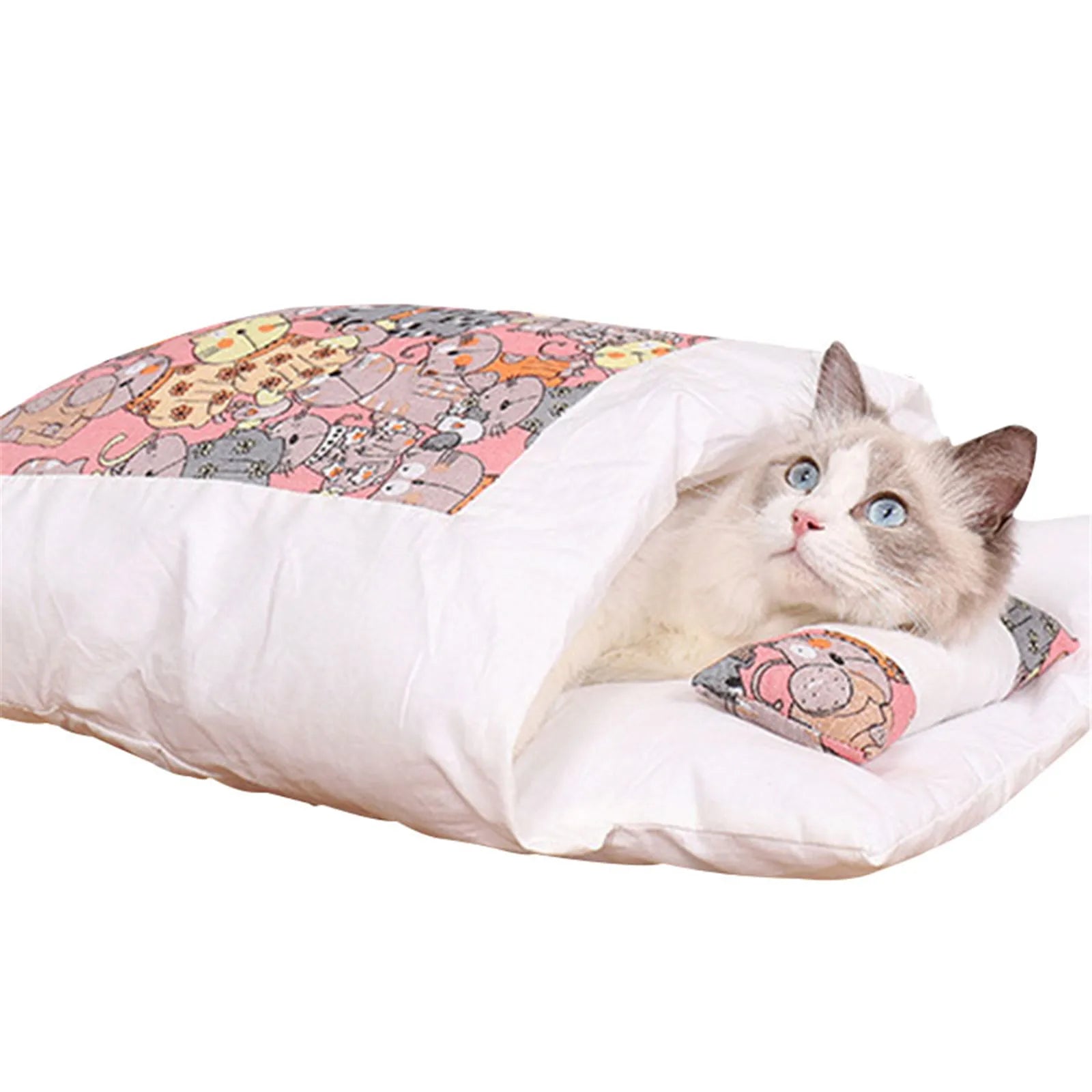 Cat with blue eyes resting comfortably inside a soft white sleeping bag featuring a colorful cartoon animal print, showcasing the Deep-Sleep Cat Sleeping Bag - Self-Warming Burrower Bed & Thermal Hideaway.